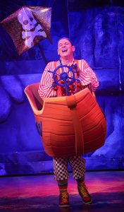 Smee in a boat at peter pan pantomime blackpool grand theatre